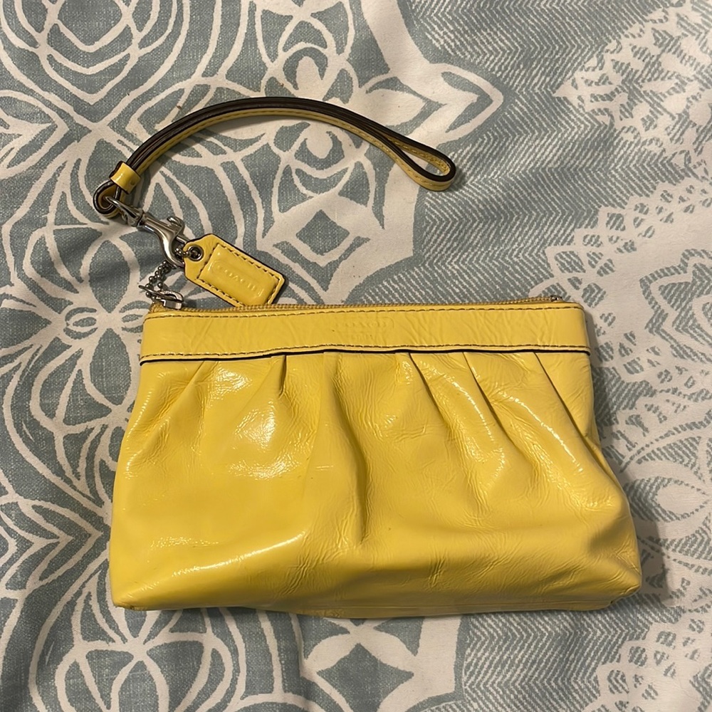 Patent leather yellow coach wristlet